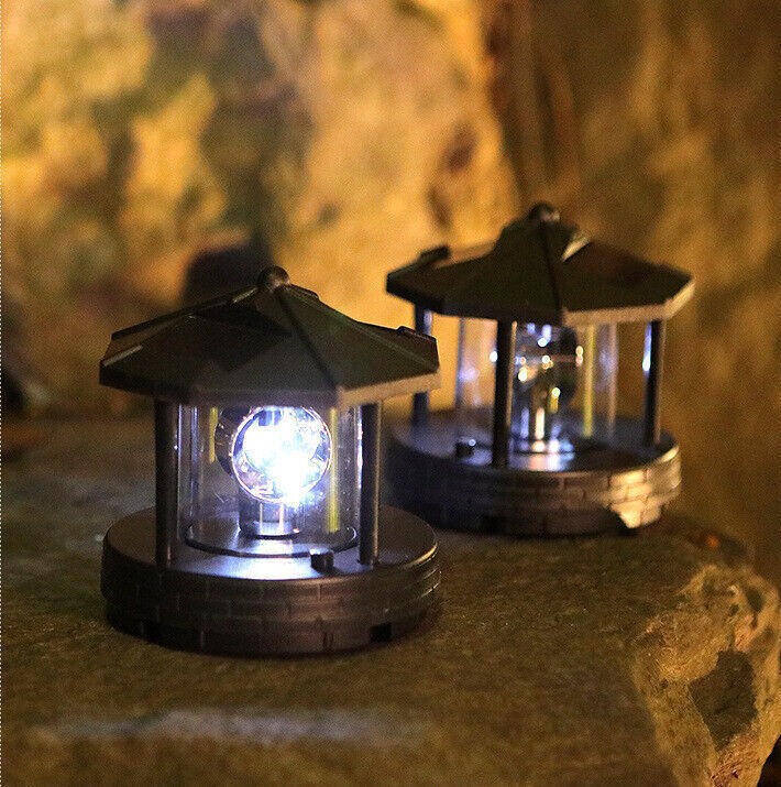 Solar Powered LED Rotating Lighthouse Night Light Outdoor Garden Home Decor Lamp