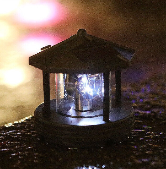 LED Solar Powered Lighthouse 360° Rotating Lamp Garden Patio Lights Decorative