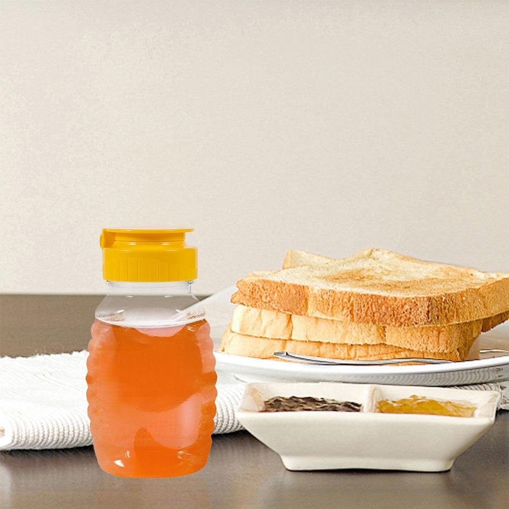 4pcs Plastic Honey Squeeze Bottles Leakproof Dispenser Jars With Refillable Lids